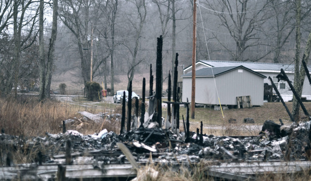 burnt-house-64a18ea387dc25ab789335b313810e57